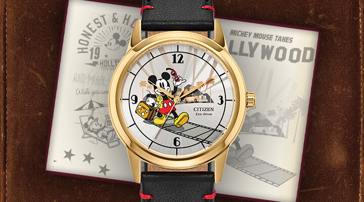 Disney Watches; Featuring Mickey Mouse Takes Hollywood watch model FE7063-07W on a leather background