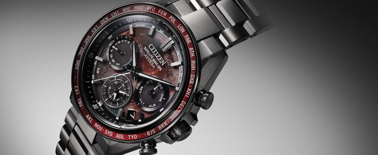 ATTESA watches; Featuring a detail image of the face of the ATTESA Shades of Red watch model CC4077-71Z