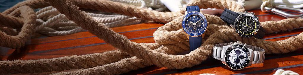Shop Men's New Arrivals banner, featuring Endeavor Chrono watch models CA4730-08E, CA4730-59A and CA4733-00L on a nautical rope background