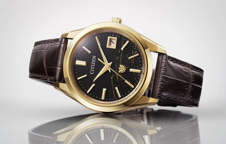 The CITIZEN Watches; Featuring an image of The CITIZEN watch model AQ4103-16W on a gray background