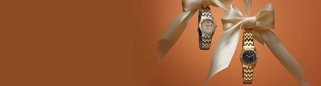 Image of Corso Diamond watch models hanging from ribbon. Featuring EW2710-51X and EW2712-55E