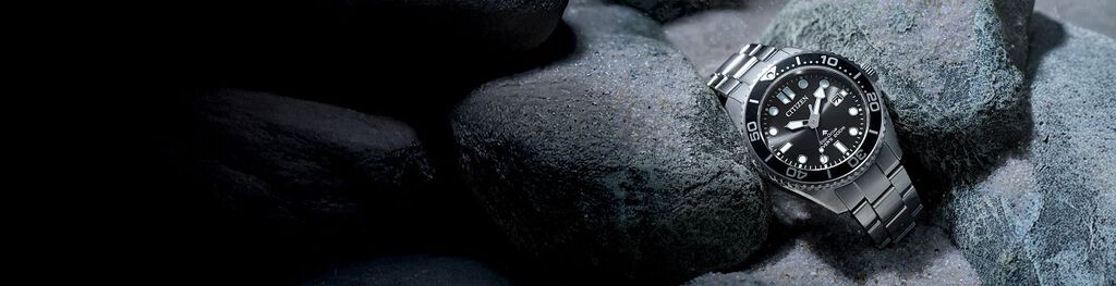 Men's Eco-Drive watches, featuring Promaster Dive watch on a rock backround