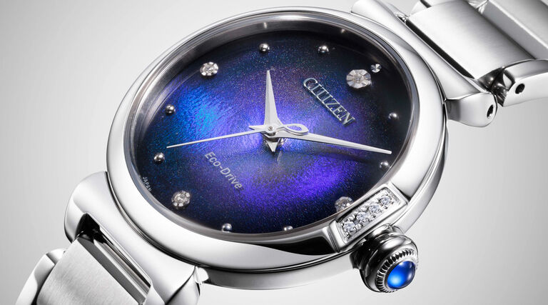 Women's New Arrival Watches; Image of Citizen L Mae watch model EM1060-87L on a gray background