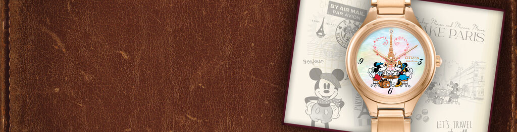 Disney Watches; Featuring Mickey Mouse & Minnie Mouse Take Paris watch model FE2103-52D on a leather background