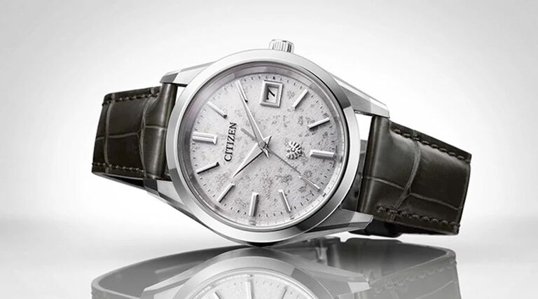 New Arrivals, featuring The CITIZEN watch model AQ4100-22A on a gray background