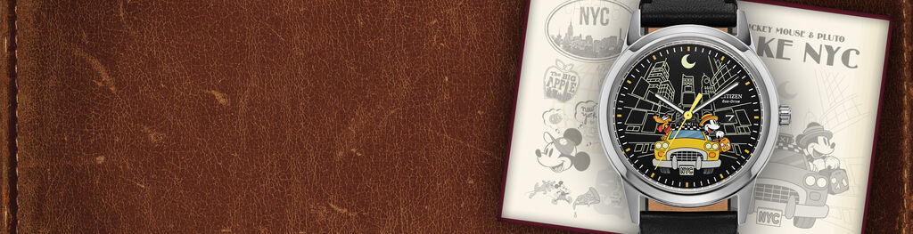 Disney Watches; Featuring Mickey Mouse & Pluto Take NYC watch model AW1860-01W on a leather background