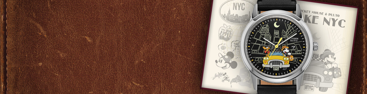 Disney Watches; Featuring Mickey Mouse & Pluto Take NYC watch model AW1860-01W on a leather background