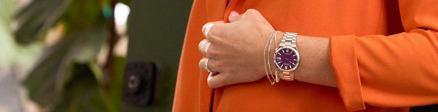 Women wearing the TSUYOSA watch model NJ0200-50W