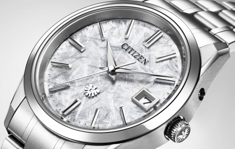 Featuring the THE CITIZEN watch model AQ4100-57B