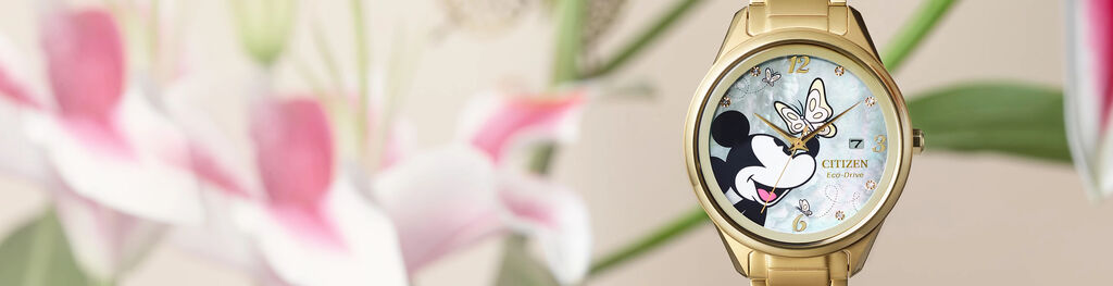 Mettant en vedet la montre Disney Flutterby , mod&egrave;le FE6192-51D