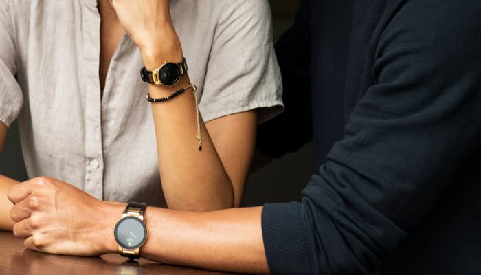 Gifts Under $550; Couple wearing the Axiom watch models AU1062-05E and GA1052-04E