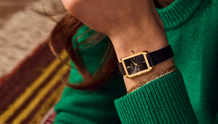 Woman wearing the Dress Classic watch model EM1192-01E