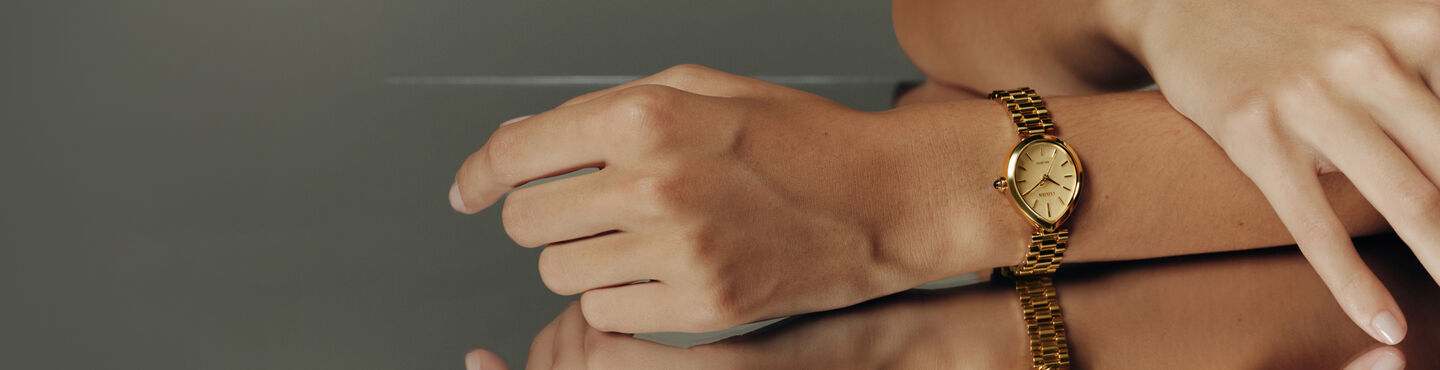 women wearing the Rainell watch model EM1202-50P