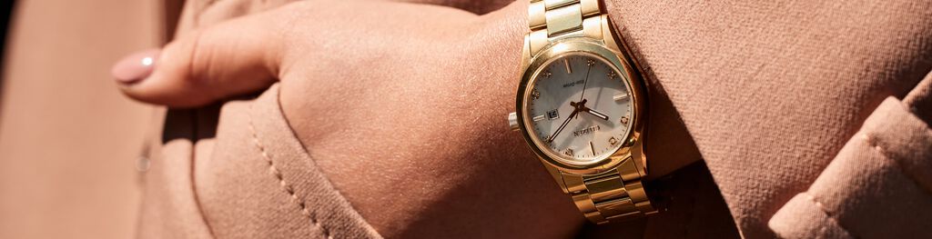 Woman wearing the Sports Luxury watch model EW2702-59D
